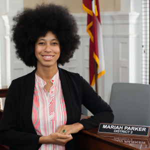 Dr. Parker was sworn in as Athens-Clarke County Commissioner at the age of 26 with her hand on a copy of The Autobiography of Malcolm X. Their goal is to create economic stability, racial justice, criminal reform and raise the minimum wage.