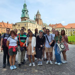 “At Memory’s Edge” seminar participants outside the Royal Castle in Warsaw, Poland. Assistant Director of the Global Experience Office and Study Abroad Advisor Kathy Landon, first row left, led the group with President Eric Boynton.