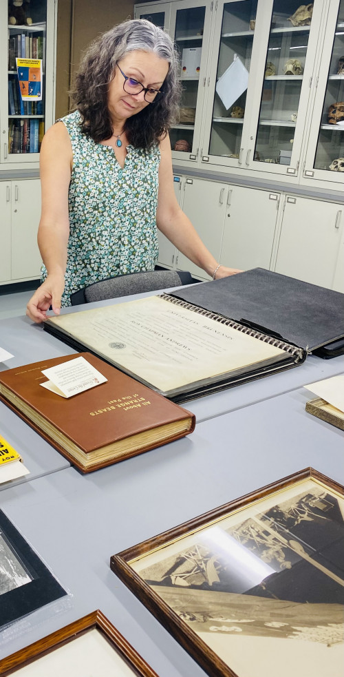 Beloit College anthropology professor Shannon Fie looks over manuscripts and archives recently donated by the family of explorer and zool...