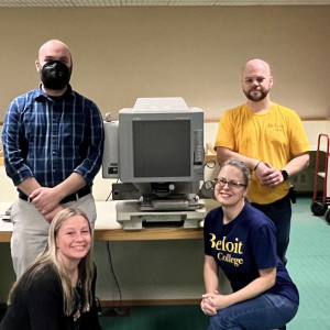 Photo caption: Beloit College Library staff hand the microfilm reader to Beloit Historical Society Assistant Director Jesse Herscher. (Left to right: Chief Information Officer and Library Director Ted Wilder, Herscher, Collection Acquisition and Access Coordinator Kallie Leonard, LITS Office Manager Shannon Nordgren, Assistant Director of LITS Adam Dinnes, College Archivist Emeritus Fred Burwell.