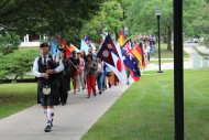 贝洛伊特大学秋季学期的开始colorful parade that includes all the international flags of first-year students as they march down College Street to the convocation ceremonies at Eaton Chapel.