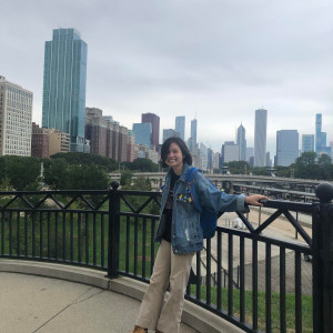Ha Truong’21 with the Chicago Skyline as Backdrop