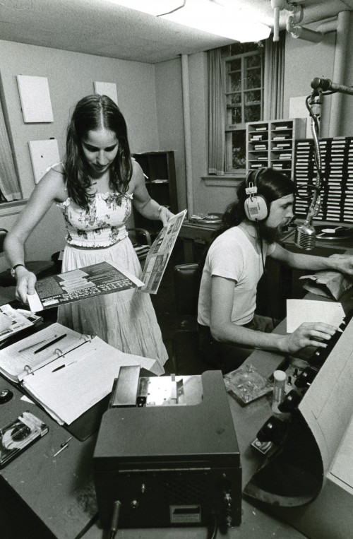 Two students operate WBCR in Haven Hall.
