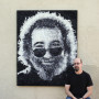 《灰色之触》(Touch of Grey)是杰里·加西亚(Jerry Garcia)的大型马赛克肖像画，是凯文·钱佩尼(Kevin Champeny)最近的艺术作品之一。